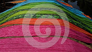 Colorful fabric drying after traditional dye process