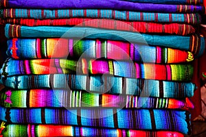 Colorful fabric found on Chichicastenango open market in Guatemala photo