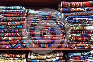 Colorful fabrics on sale in a shop Muttrah Souk, in Muttrah, Muscat, Oman, Middle East