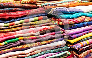 Colorful fabrics and textile close up background