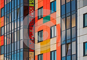 Colorful facade of a modern apartment building.Part of the city`s real estate