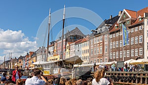 Colorful facade and old ship along the Nyhavn or New Harbor, Copenhagen