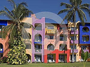 Colorful facade of a tropical resort building photo