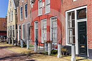 Colorful facades of brick houses in Harlingen