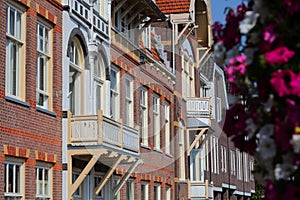 The colorful facades of historic houses located along Oude Doelenkade street