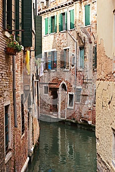 Colorful facades of old medieval houses in Venice.