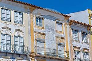 Colorful facades at Praca do Giraldo square in Evora, Portugal