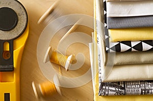 Colorful fan of fabrics on the wooden table