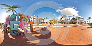 Colorful Fantasy Fest sign Key West 360 equirectangular stock photo