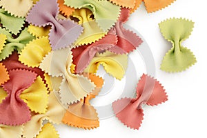 colorful farfalle pasta isolated on white background with full depth of field. Top view. Flat lay.