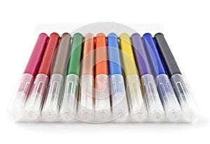 Colorful felt-tip markers (pen) over white