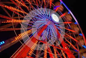 Colorful Ferris wheel lights at night