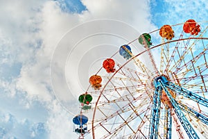 Colorful ferris wheel and sky