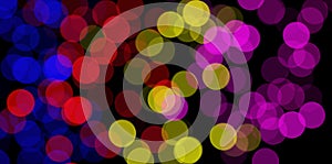 Colorful festive bokeh. Bright lights. Merry Christmas and happy New year. Background.