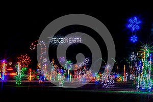 Colorful festive Holiday Christmas Light display, Peace on Earth