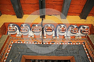 Colorful Figures Guarding Monastery Doorway, Bhutan