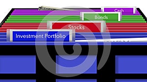 Colorful file folders with labels show a person`s record keeping regarding an investment portfolio. Tabs include stocks, bonds an