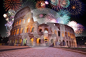 Colorful Fireworks above the Colosseum in Rome, Italy. Celebrating New Years Eve