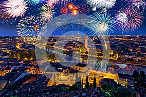 Colorful Fireworks above Verona Cityscape, in Italy, Celebrating New Years Eve