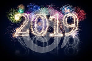 colorful fireworks display and bright sparkler pyrotechnic number 2019 happy new year