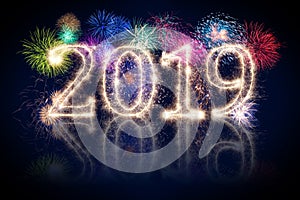 colorful fireworks display and bright sparkler pyrotechnic number 2019 happy new year