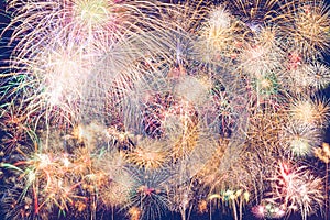 Colorful fireworks fully shining on blue background