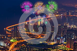 Colorful fireworks and Gwangan Bridge in Busan City , South Korea.