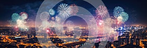 Colorful fireworks over the city at night, panoramic view