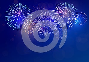 Colorful fireworks vector on dark blue background with sparking bokeh