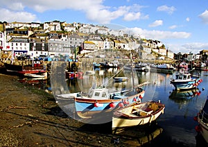 Colorful fishing boats at anchor in Mevagissey