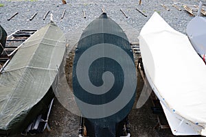 Colorful fishing wooden boat moored on the beach