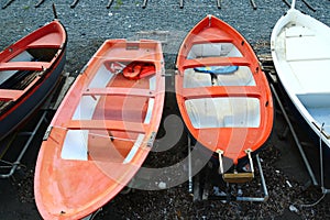 Colorful fishing wooden boat moored on the beach