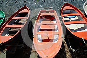 Colorful fishing wooden boat moored on the beach