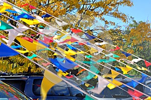 Colorful flags at a car dealership