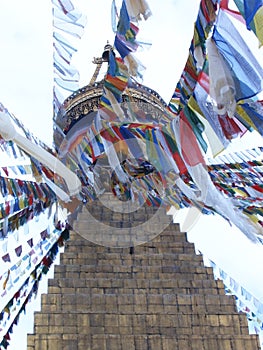 Colorful flags at Kathmandu`s biggest buddhist stupa, the Boudhanath stupa