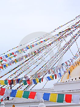 Colorful flags at Kathmandu`s biggest buddhist stupa, the Boudhanath stupa