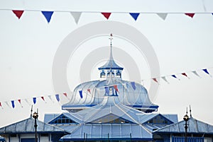 Colorful flags and tin roofs on the RÃ¼gen beach on the Ostsee