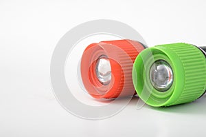 Colorful flashlights on a white background