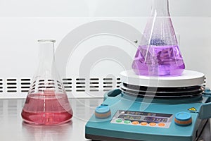 Colorful flasks in laboratory