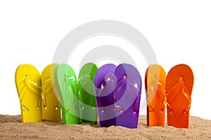 Colorful Flip-Flop Sandles on a Sandy Beach