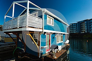 Colorful floating homes in the harbour.Economical living in overcrowded city