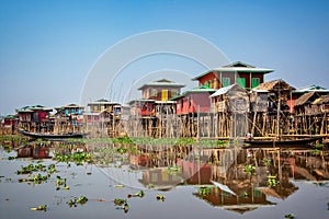 Colorful floating village with stilt-houses on Inle lake in Burma Myanmar