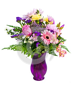 Colorful flower bouquet arrangement in vase photo