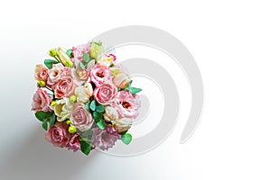 Colorful flower bouquet from roses isolated on white background. Fresh, lush bouquet of colorful flowers. Original