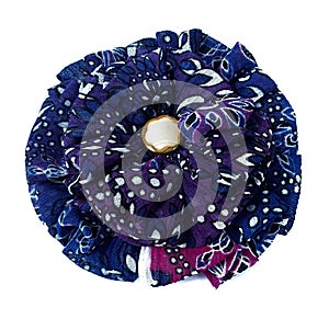 colorful flower brooch on white background