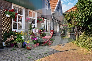 Colorful flower garden on a street in Edam, Netherlands, Europe