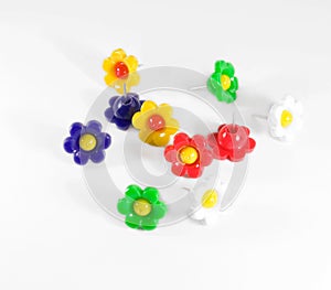 Colorful flower push pins against