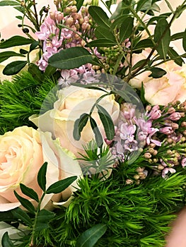 Colorful flowers bouquet isolated. Composition with Colorful. Flowers. Syringa and white roses, and green leaf. . Close-up