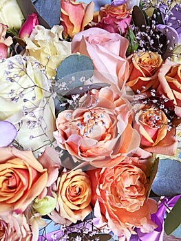 Colorful flowers bouquet isolated. Mix flowers. Beautiful summer bouquet. Concept of a flower shop. Orange roses, pink