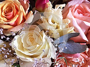 Colorful flowers bouquet isolated. Mix flowers. Beautiful summer bouquet. Concept of a flower shop. Orange roses, pink roses ,